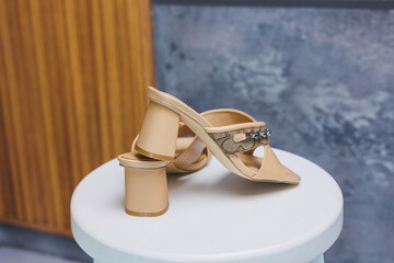 Beige slippers women's leather loafers. Casual women's style. Fashion footwear.