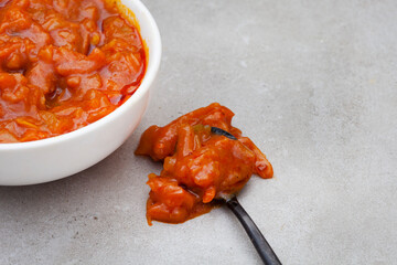 South African vegetable relish or side dish called Chakalaka, originating from townships on light...