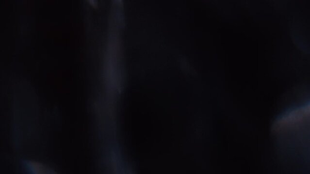 Prism Light Flares. Slow Motion of Chromatic Bokeh