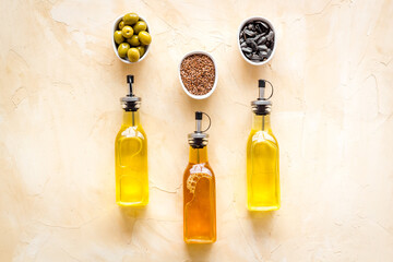 Different kind of cooking oil - sunflower olive and sesame oil with seeds - obrazy, fototapety, plakaty