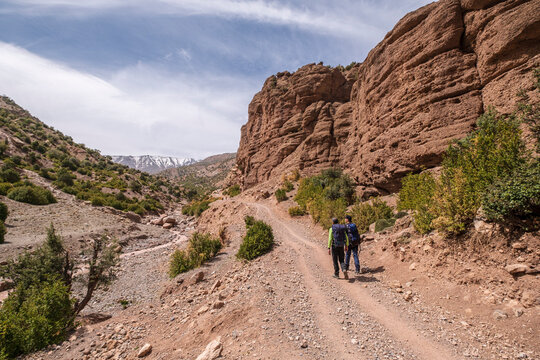 walkers on the road, Arous, Bougames valley, Atlas mountain range, morocco, africa