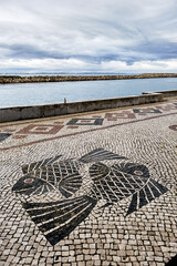 Traditional Portuguese style Calcada Pavement for pedestrian area in Lagos, Algarve, Portugal