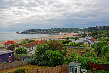 A panorama of the beautiful wooded bay of St Brelades Bay in the Channel islands in the U.K.