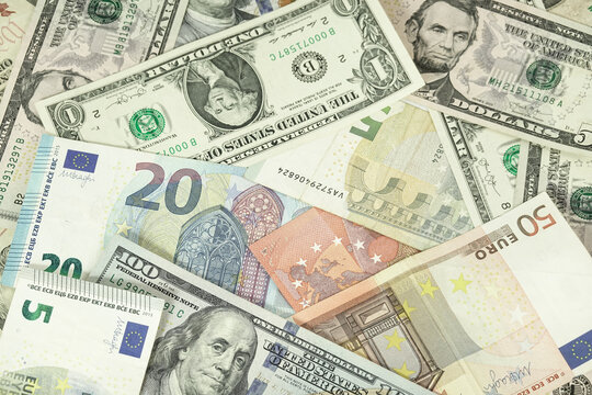 A backgrounds with colorful of many pile currency from many country