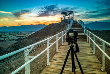 Morning at top of the hill with illuminated pergola, public park in vicinity of Eilat  - famous...