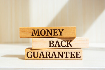 Wooden blocks with words 'Money back guarantee'.