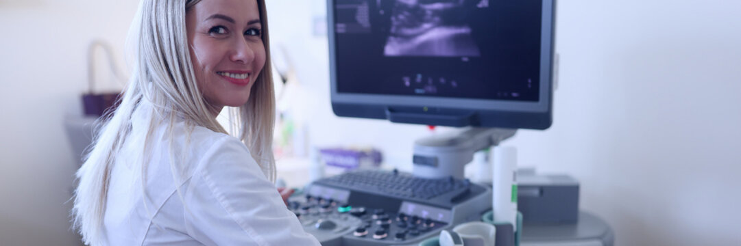 The Ultrasound Doctor Examines The Woman's Abdominal Cavity