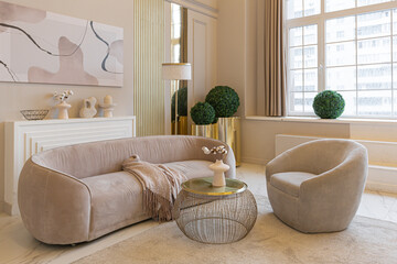 the latest fashion home trends in an ultra modern elegant interior of a cozy studio in soft pastel...