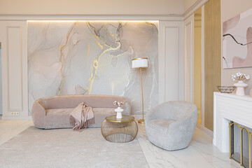 the latest fashion home trends in an ultra modern elegant interior of a cozy studio in soft pastel colors. close-ups of a stylish living area with golden elements
