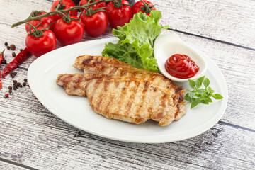 Grilled pork steak with ketchup