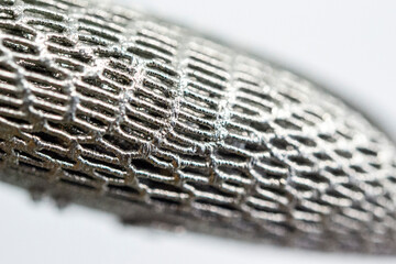 Model printed on 3D printer for metal close-up macro. Three-dimensional model printed on metal 3D printer. Model printed laser sintering machine for metal. Form printed by selective laser melting