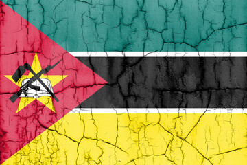 Textured photo of the flag of Mozambique with cracks.