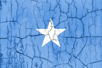 Textured photo of the flag of Somalia with cracks.