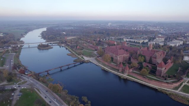 Malbork. Teutonic Castle in Malbork from a drone. Pomerania, Poland. Sunset in Malbork.