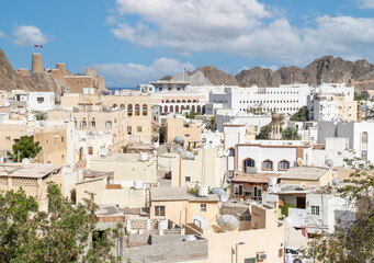 Muscat, Oman - capital and most populated city in Oman, Muscat displays amazing spots where its white buildings are surrounded by impressive mountains and rock formations