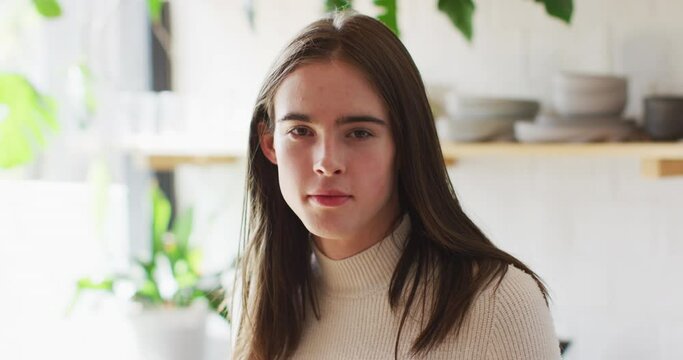 Portrait of happy caucasian non-binary transgender woman