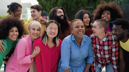 Multiethnic young people having fun together outdoor - Diverse friends youth community