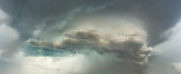 dramatic storm with stormy clouds and rain on sky