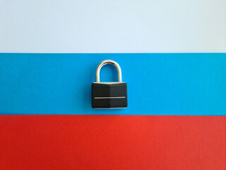 Closed padlock on Russian flag economic sanctions