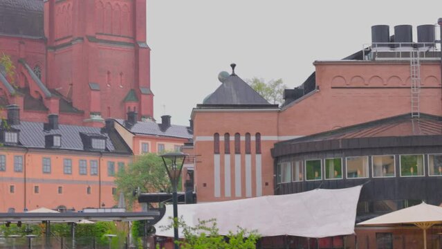 Beautiful view of historic Uppsala Cathedral Church during heavy rain in spring. Sweden.