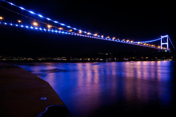 Fatih Sultan Mehmet Bridge of Istanbul at Night with Blue and Purple Vivid Colors. Marmara Sea. Bosphorus. Turkey.