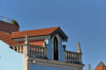 Fototapeta na wymiar decorated attic and tiled roof in Leiria, portugal