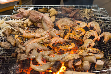 grilled shrimp and pork on grill