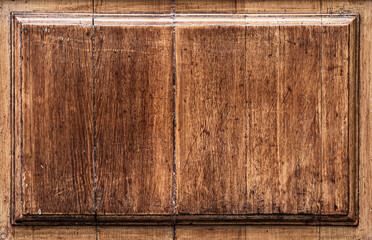 Old worn and weathered wood panel - Background image of a rustic and old-fashioned wooden board