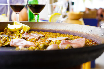 Paella at seaside restaurant  on the coast