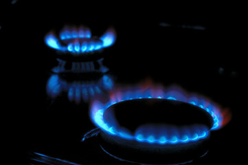 gas burner with burning gas. dark background