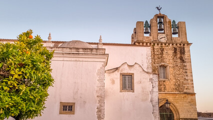 Medieval cathedral in Faro, Portugal at the sunset.