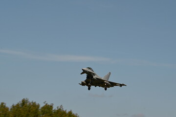 Fototapeta na wymiar Military NATO fighter jet landing on Airfield, UK defence 