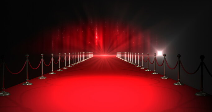 Red carpet with spotlights against red background
