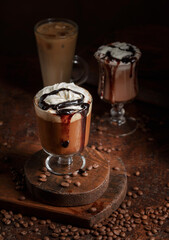 Coffee and chocolate drinks with whipped cream.