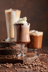 Coffee and chocolate drinks with whipped cream.