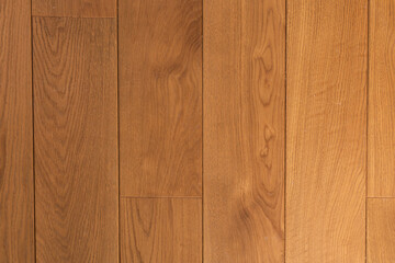 Top view of an parquet floor under natural light. Wooden pattern with oak texture.