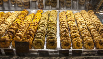 Italian pastries on the showcase in cafe in Naples