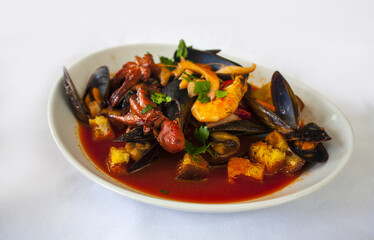 Italian salad with seafood - octopus, calamary, mussels and clams