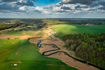 Aerial landscape of Radunia rive meanders and Kashubian forests, Poland - obrazy, fototapety, plakaty