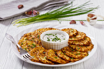 spelt flour pancakes on white plate, top view