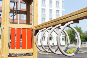 Fototapeta na wymiar children playground, walkways and benches in sunny summer day.