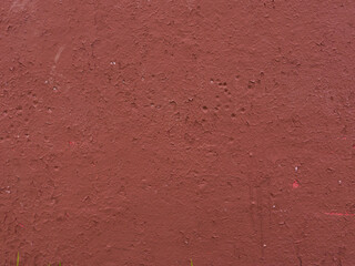 Fototapeta premium Peeling brown plaster on the wall.