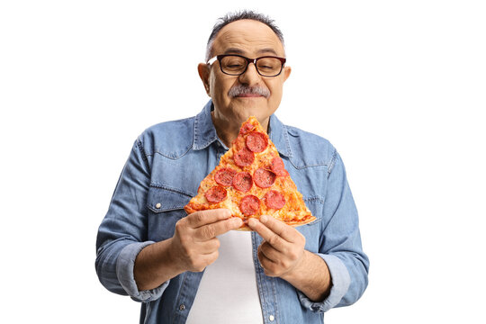 Mature Man Smelling Pepperoni Pizza Slice And Enjoying