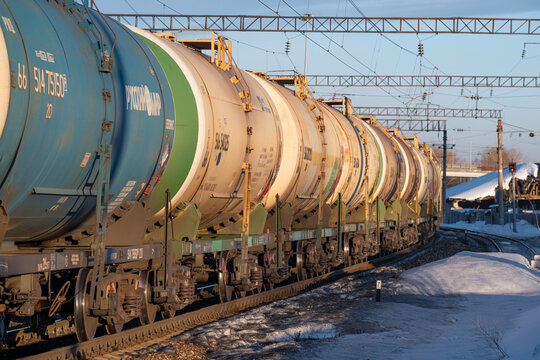 SHARYA, RUSSIA - MARCH 19, 2022: Railway tanks for the transportation of petroleum products on a sunny March evening. Sharya Station, Northern Railway