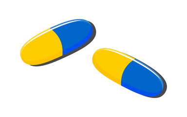 Pills yellow with blue isolated on white background. Capsules with medicine or chemical composition for treatment. 