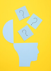Open your mind, mental health concept, creative thinking. Paper silhouette of human head with...