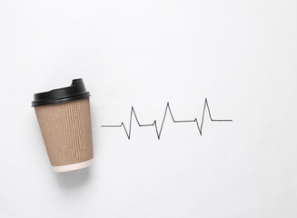 cardboard coffee cup with heart rate line isolated on white background. Energy boost for the whole...
