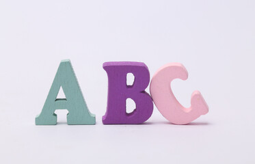 Word abc from colored letters isolated on white background.