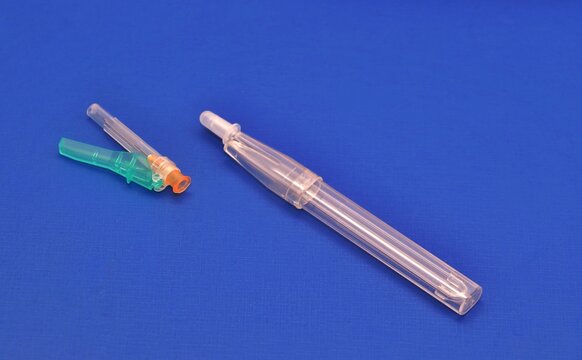 Arterial Blood Gas Analysis Needle And Collection Kit. Image Isolated On A Blue Background