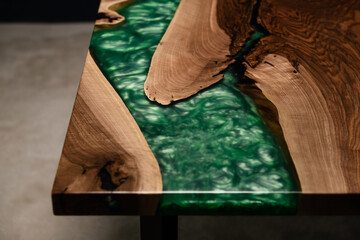 new table made of natural wood and green epoxy resin